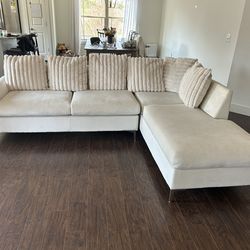 White couch with chaise lounge