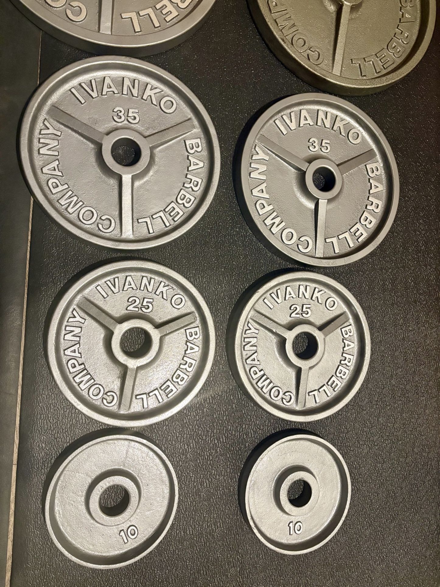 Set of Olympic Vintage IVANKO Weight Plates: Pairs of 45s, 35s, 25s and 10s. Reconditioned Total: 230 #