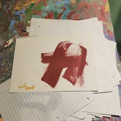 Abstract Red Brushstroke Artwork on Paper