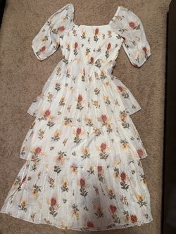 White multilayer dress with floral pattern and corset torso part, half sleeves