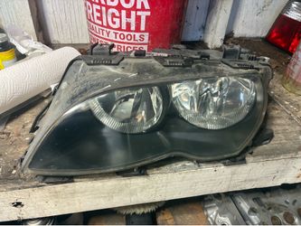 2003 bmw 330 left headlight