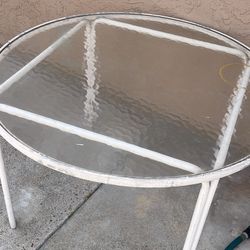 Round glass top table