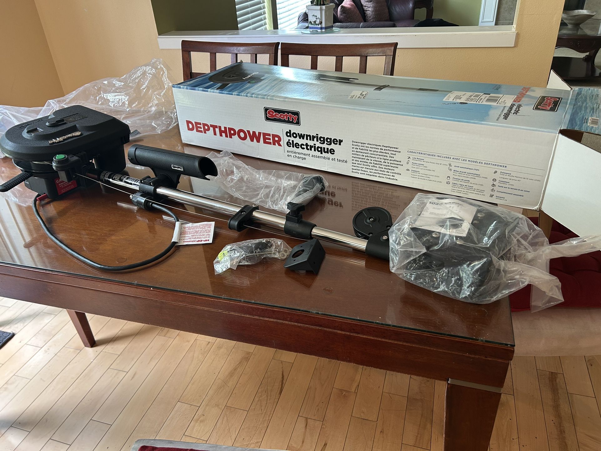 In the box. Never been used before. Scotty #1106B Depthpower Electric Downrigger