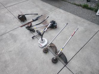 Troy built  gas weedeater with attachments