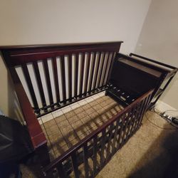 Used Crib w/ Attached changing table and shelves
