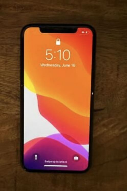 iPhone X for sale phone is in a good functional condition, there's a screen crack in lower left side but doesn't have much impact on display quality