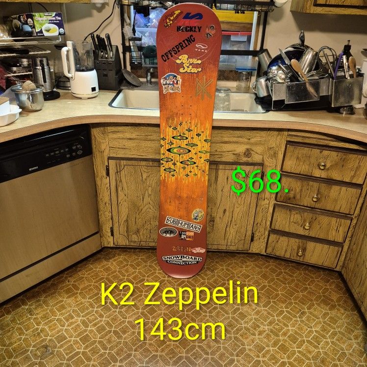 #007... Snowboard K2 Zeppelin 143cm