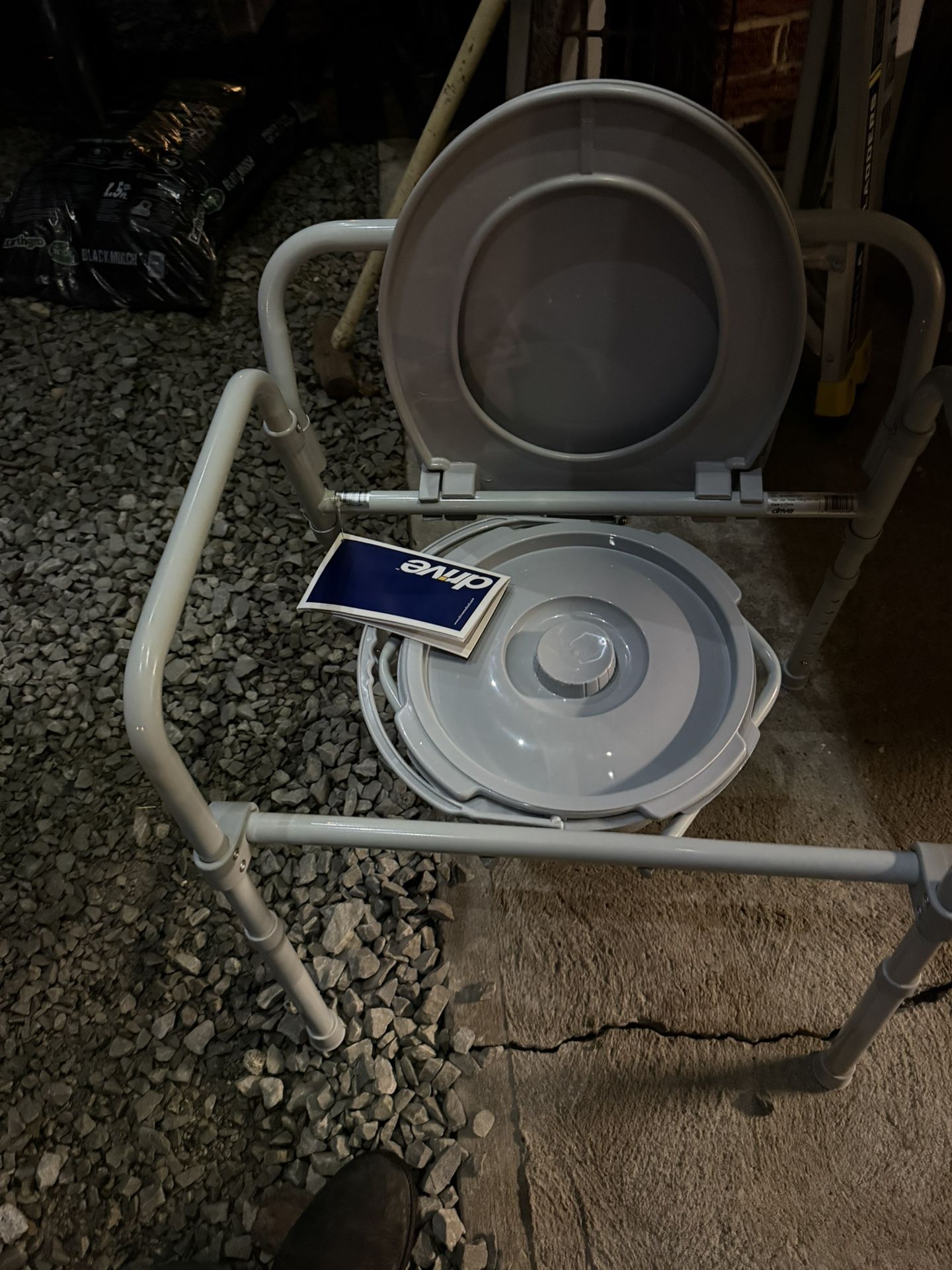 Drive brand folding steel bedside commode