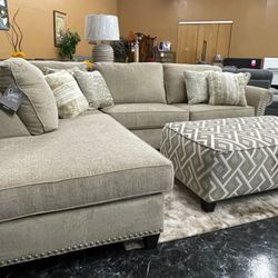Beige Sectional with Accent Pillows