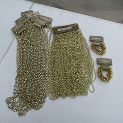 Six Sets Of Three 48” Gold Plastic Beaded  Necklaces Plus Bracelets, Plus Two Sets Of 24 30” Necklaces