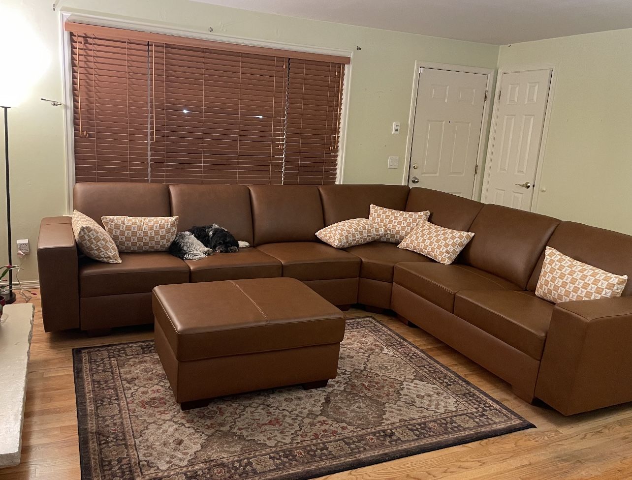 COSTCO Genuine top grain leather sectional couch and ottoman