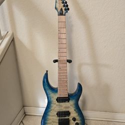 7 string blue/green Legator Ninja electric guitar