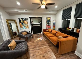 CB2 Abruzzo Charcoal Leather Tuft Chairs
