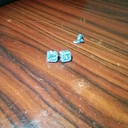 Earrings. 1 Pair Of Diamond Studs. And A Single Boot Earring