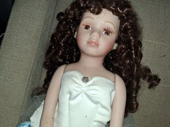 Porcelain Doll with Curly Brown Hair