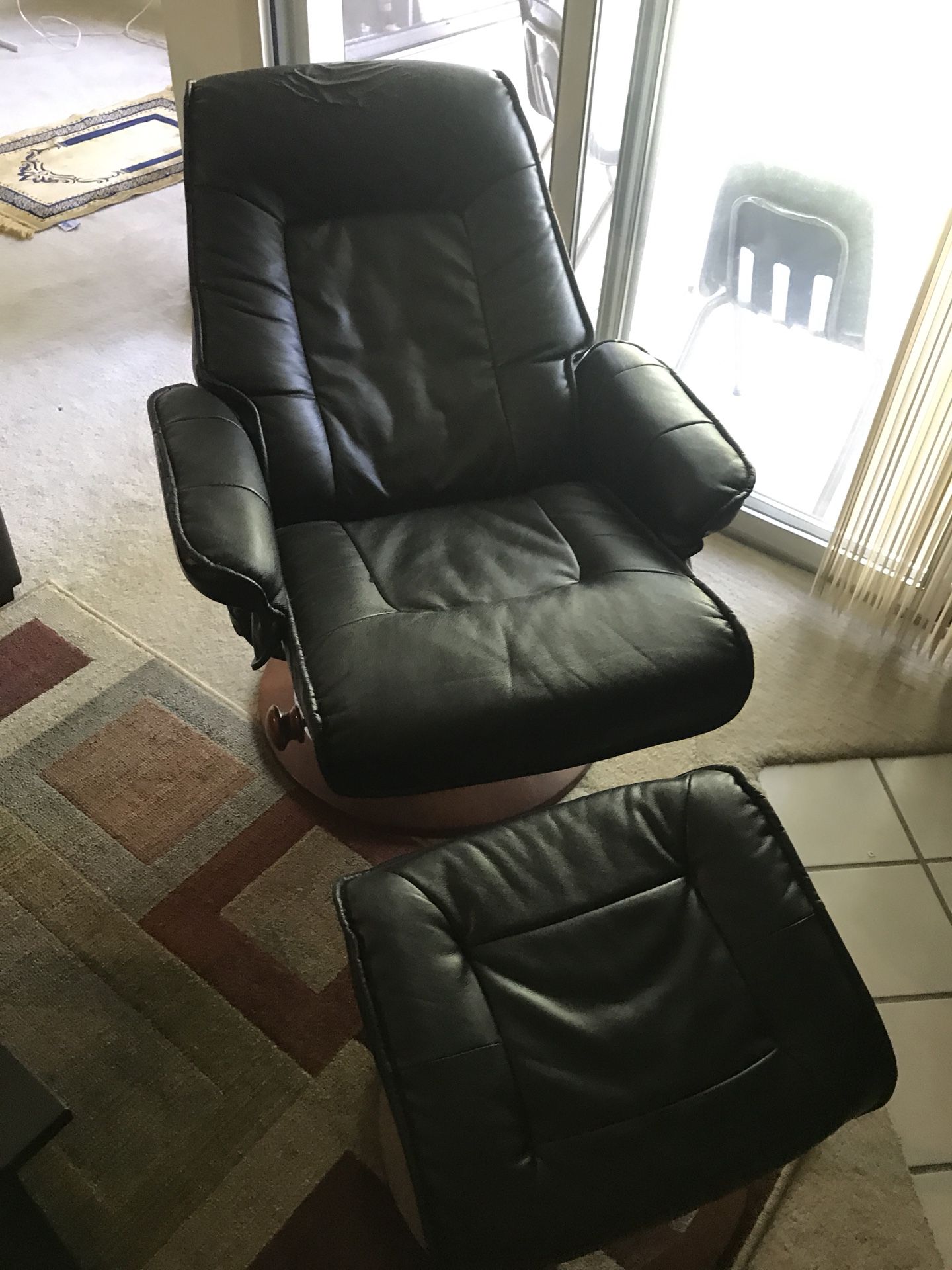 Leather recliner chair with ottoman