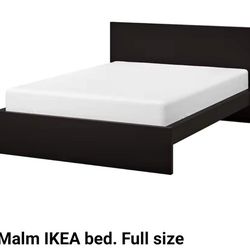 Black Ikea bed frame and night stand
