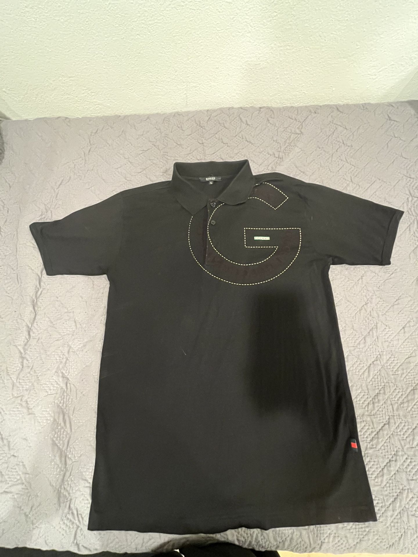 L Gucci polo shirt