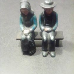 ANTIQUE DALECRAFT AMISH COUPLE CAST IRON