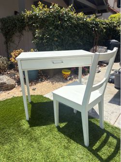 White desk with drawer and chair