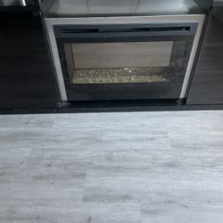 Glass Entertainment TV Stand With Electric Fire Place