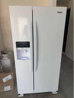 Whirlpool side by side refrigerator