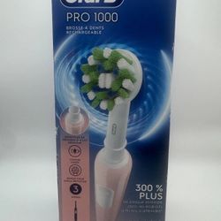 Oral-B Pro 1000 CrossAction Electric Toothbrush Powered by Braun Pink
