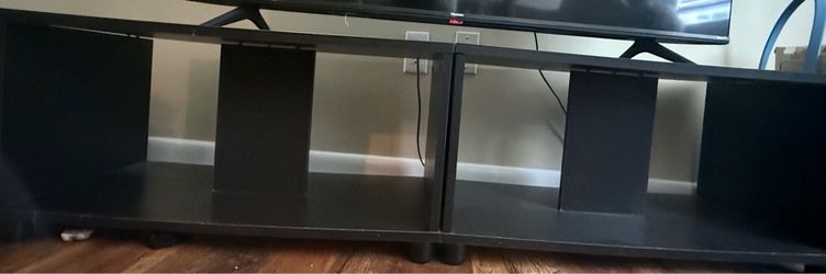 TV stand / shelf. Can be used as a TV stand or assembled as a shelf. $25.”