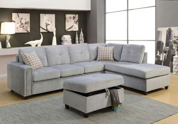 grey sectional 111x75, new in boxes