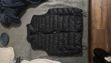 blue polo vest