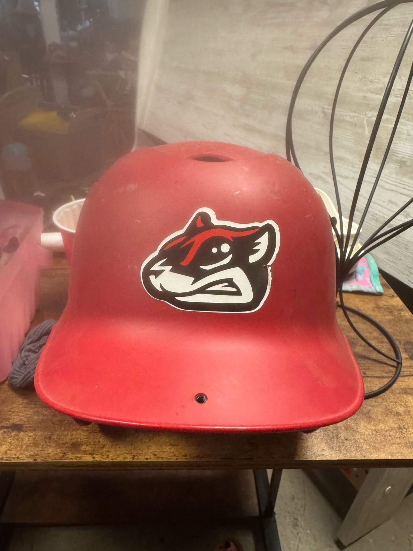 Red baseball helmet S/M pick up 1116 airport dr or rosedale with advance notice