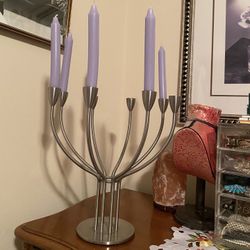 Large stainless steal candle holder.