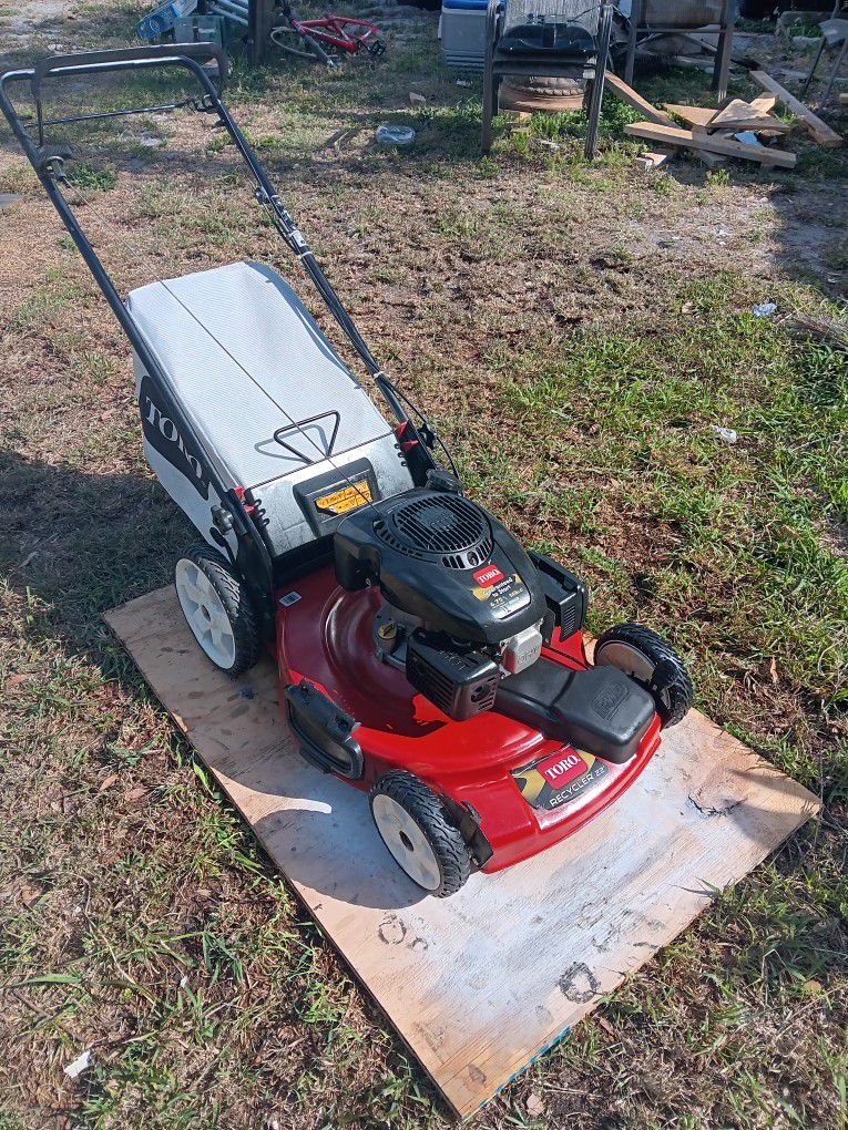 Self-propelled 22-inch 6.75 horsepower lawn mower.