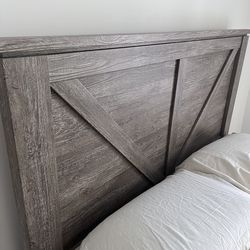Queen sized bed frame with mattress and mattress box