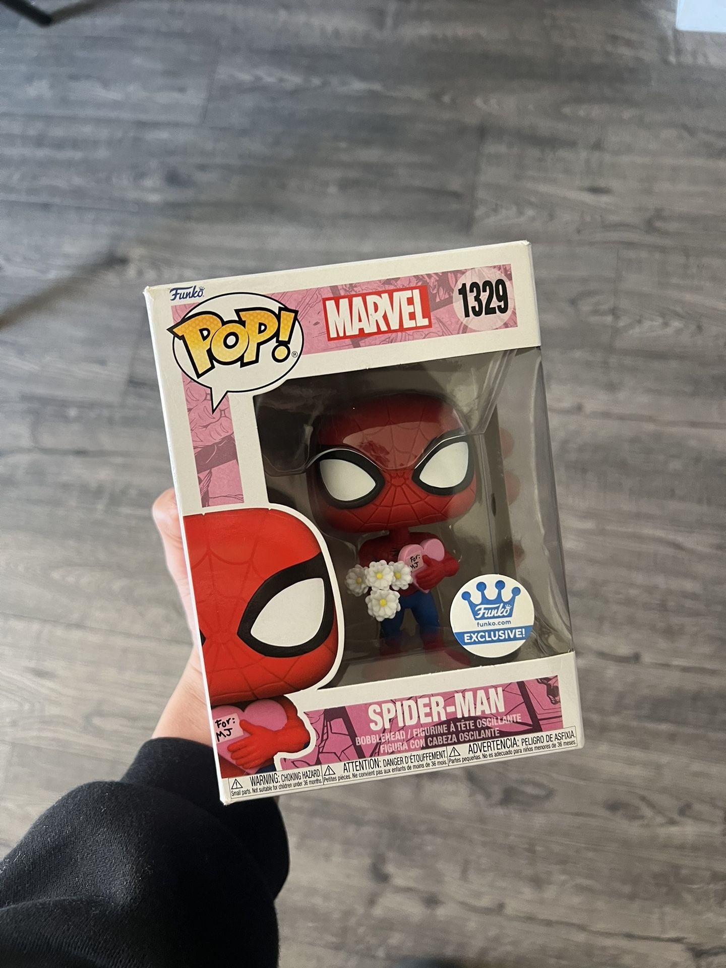 Spider-Man Holding Flowers