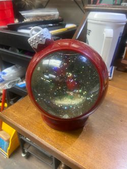Light up snow globe cardinals