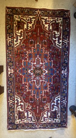 Vintage Heriz handmade Persian rug.