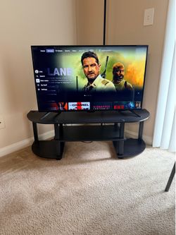 Insignia 43-inch 1080p LED TV with entertainment stand