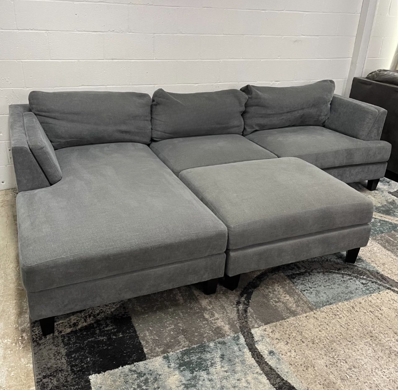 Gray Sectional Sofa Free Delivery Costco Couch Ottoman Set