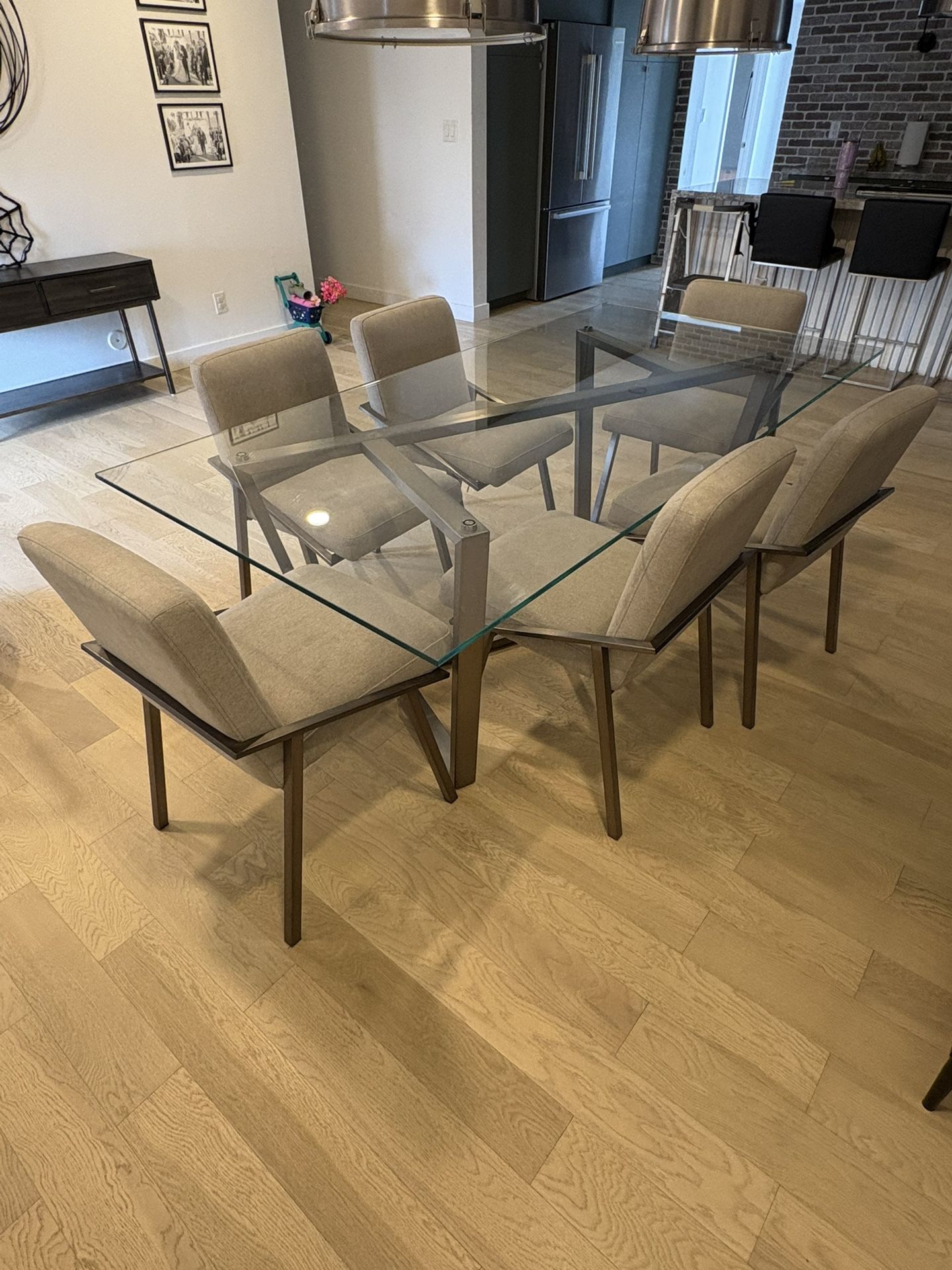 Living Spaces Glass Top And Stainless Steele Dining Table and Chair Set