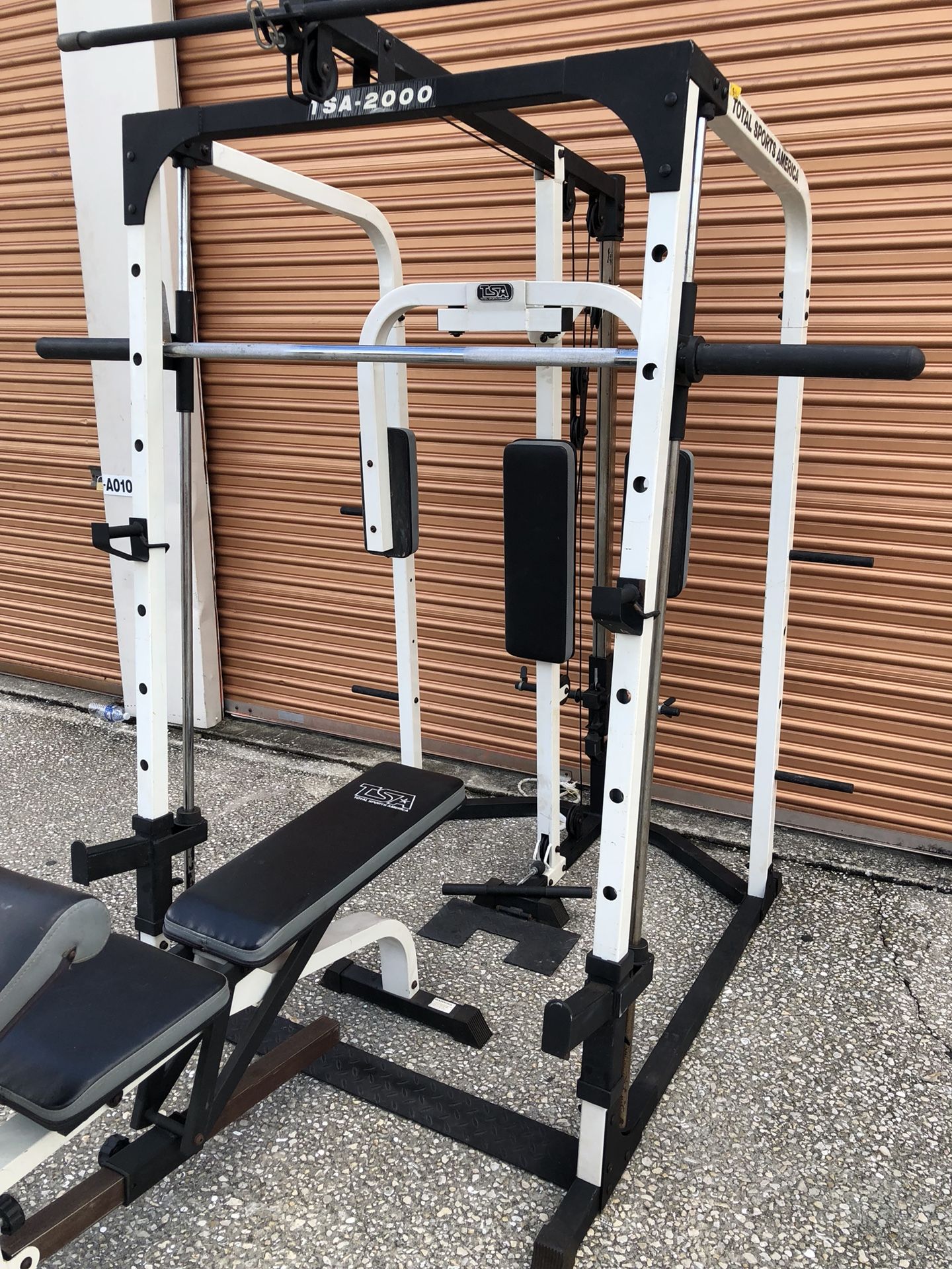 TSA 2000 Smith Machine Squat Rack Pec Deck Lat Pull Low Row Bench for Sale in Davenport FL OfferUp