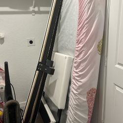 A Twins Bed Mattress In The Frame