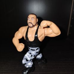 vintage 1991 Hasbro WWF Wrestling Action Figure of Luke Bushwacker, part of The Bushwhackers tag team. 