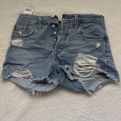 Light washed 501 Levi distressed denim shorts