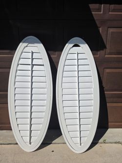 Large louvered oval decor