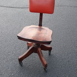 Early Beautiful mahogany solid wood till heightfully adjustable swivel brass studded leather Orange backrest chair