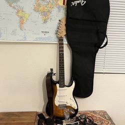 Fender Guitar/Bag/Tuner/Strap/Pick/Amp Cord/Tremolo Arm