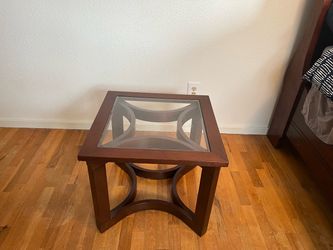 Sold wood sleigh bed and 2 nightstands