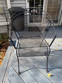 Black metal patio chair