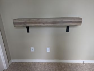 Neutral color 48" floating mantle with added carbon steel brackets